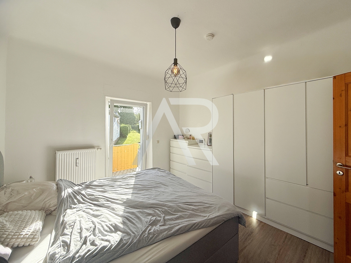 Schlafzimmer mit Balkonzugang
