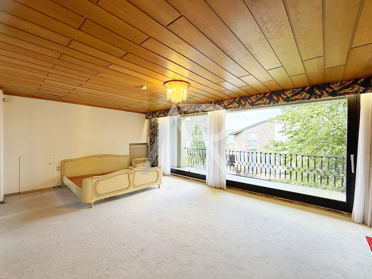 Schlafzimmer mit Balkon